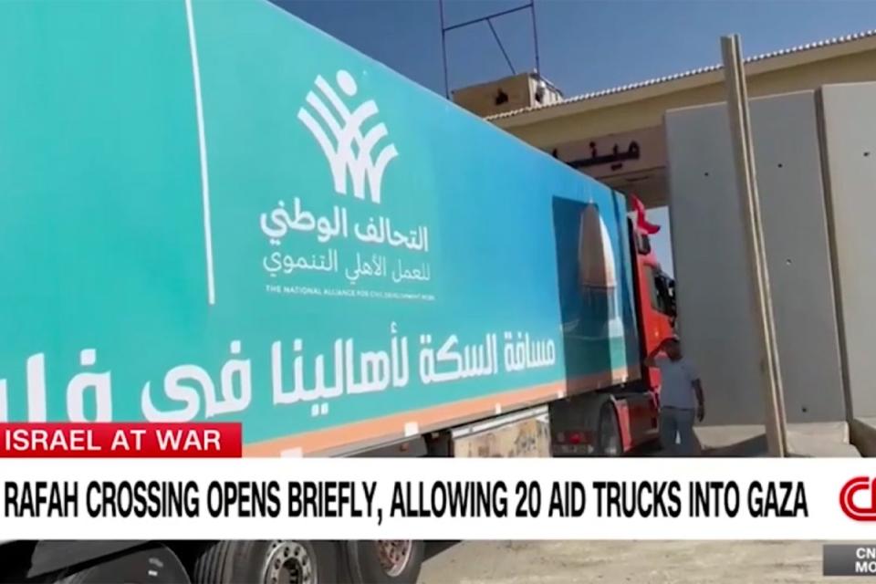 <p>CNN</p> Aid trucks enter the Gaza Strip on Saturday, October 21, 2023.