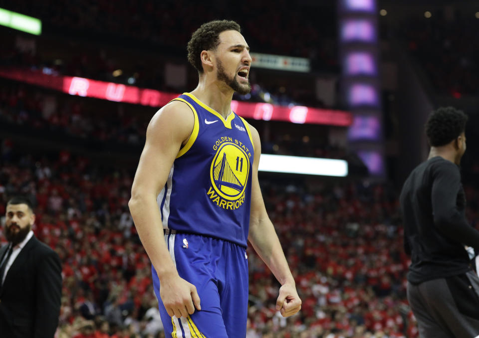 Golden State Warriors guard Klay Thompson celebrates the team's win over the Houston Rockets in Game 6 of a second-round NBA basketball playoff series Friday, May 10, 2019, in Houston. Golden State won 118-113, winning the series. (AP Photo/Eric Gay)