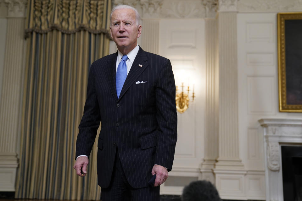 President Joe Biden leaves after speaking about efforts to combat COVID-19, in the State Dining Room of the White House, Tuesday, March 2, 2021, in Washington. (AP Photo/Evan Vucci)