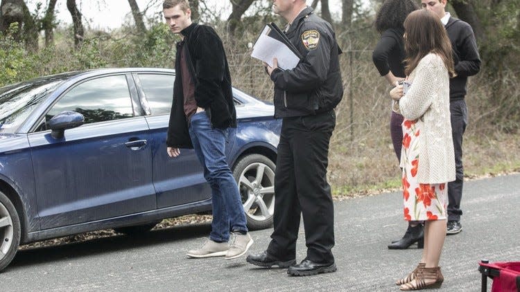 Nicolas Shaughnessy talks to law enforcement after his father, Theodore Shaughnessy, owner of Gallerie Jewelers in Austin, was shot and killed March 2 inside his home in southwestern Travis County. Shaughnessy 19, and his wife, Jaclyn Alexa Edison, 19, have been charged with soliciting to commit capital murder in connection with his father’s death. (RESHMA KIRPALANI / AMERICAN-STATESMAN)