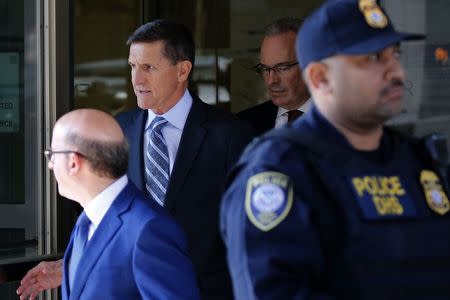 Former U.S. National Security Adviser Michael Flynn departs U.S. District Court, where he was expected to plead guilty to lying to the FBI about his contacts with Russia's ambassador to the United States, in Washington, U.S., December 1, 2017. REUTERS/Jonathan Ernst