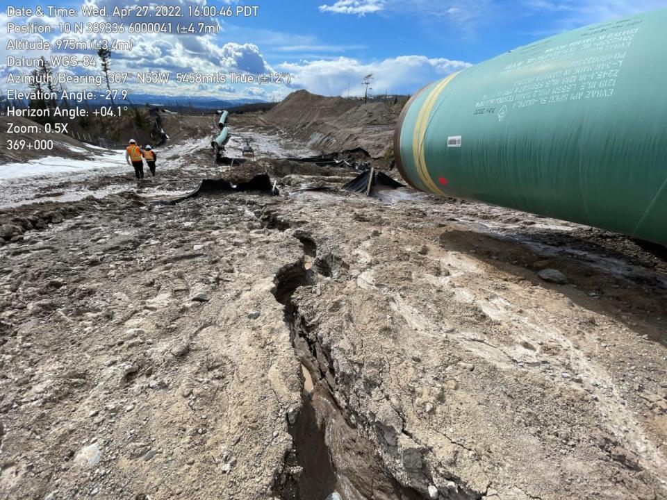 A photo taken by a B.C. government inspector at a Coastal GasLink pipeline right of way in April 2022 shows soil erosion that violates the conditions of the company's environmental permit. An EAO white stamp in the top left corner indicates the location and time the photo was taken.  (Contributed/Ministry of Environment and Climate Change - image credit)