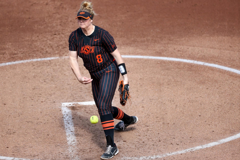 Oklahoma State pitcher Lexi Kilfoyl (8) pitches during a college softball game between the Oklahoma State Cowgirls (OSU) and the Baylor Bears at Cowgirl Stadium in Stillwater, Okla., on Saturday, March 25, 2023.