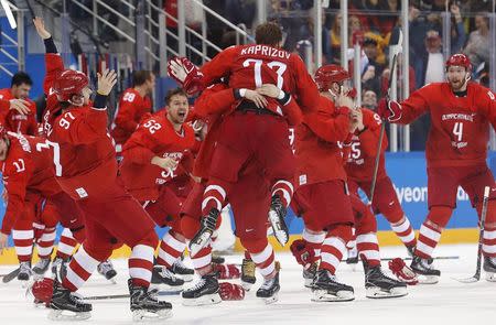 Ice Hockey - Pyeongchang 2018 Winter Olympics - Men's Final Match - Russia - Germany - Gangneung Hockey Centre, Gangneung, South Korea - February 25, 2018 - Olympic Athlete from Russia Kirill Kaprizov reacts with teammates after scoring a goal. REUTERS/Kim Kyung-Hoon