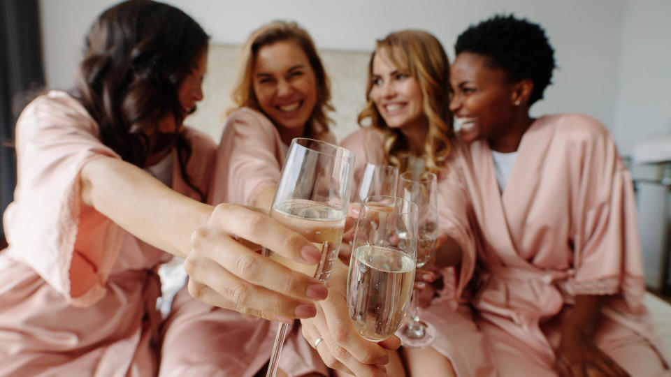 Women celebrate a bachelorette party of bride.