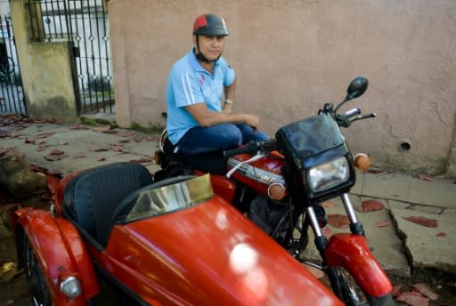 Restauranteur Alejandro Prohenza Hernandez is the proud owner of a 30 year-old Czech-built Jawa 350 motorcycle with a sidecar