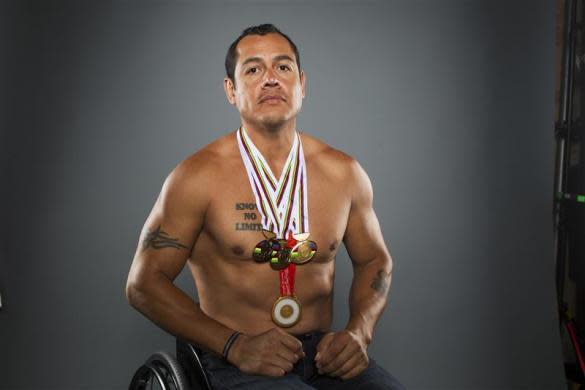 Paralympic cyclist Oz Sanchez poses for a portrait during the 2012 U.S. Olympic Team Media Summit in Dallas, May 15, 2012.