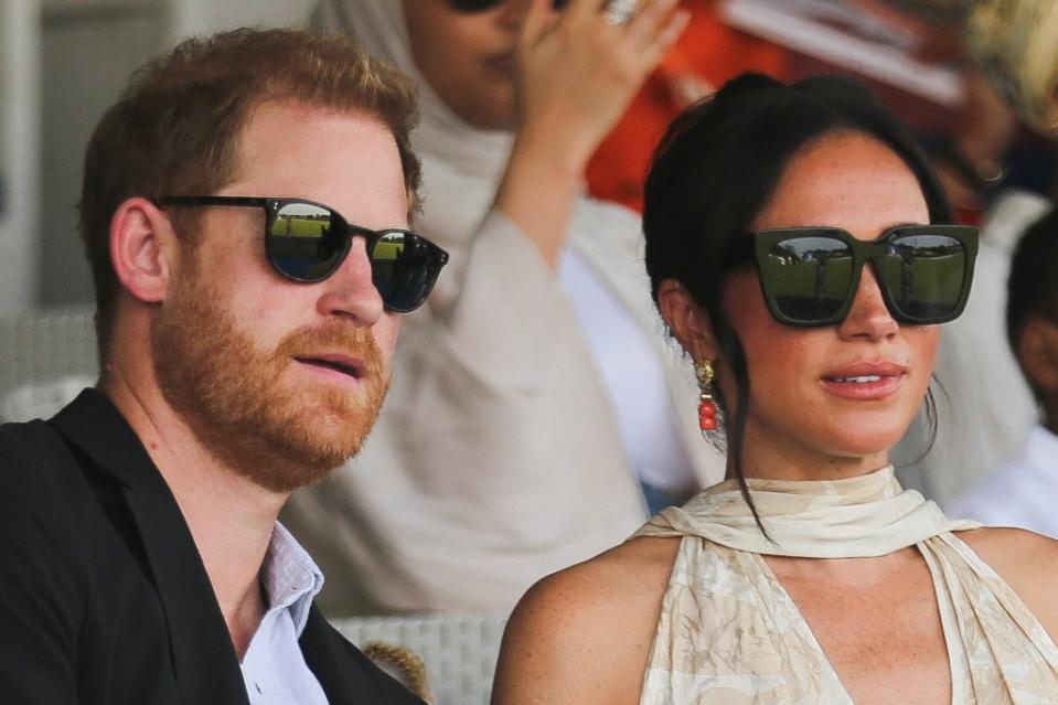 Prince Harry and Meghan Markle in Lagos, Nigeria on May 12, 2024. REUTERS