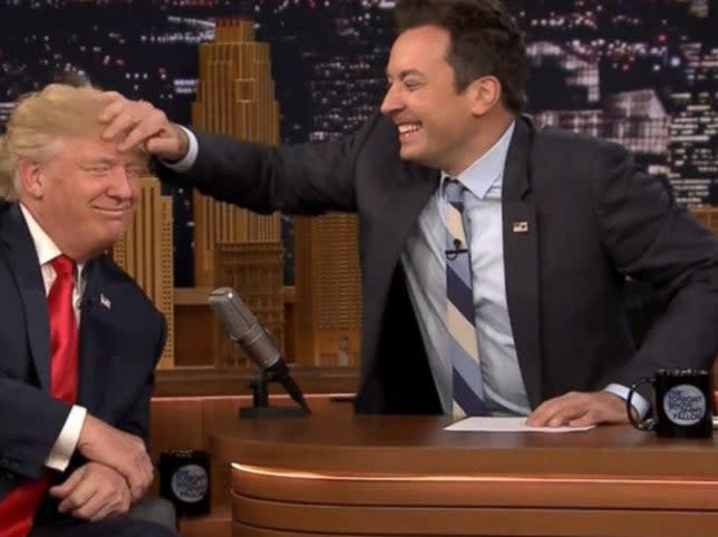 Jimmy Fallon musses Donald Trump's hair in his controversial 2016 interviewYouTube/screengrab