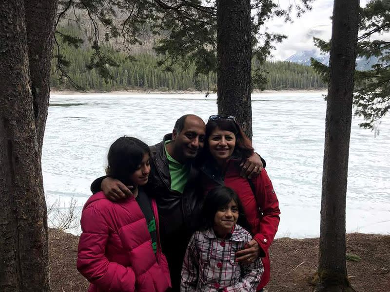 University of Alberta professors Mojgan Daneshmand and Pedram Mousavi pose in an undated family photo