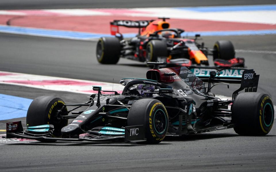 Mercedes' British driver Lewis Hamilton drives ahead of Red Bull's Dutch driver Max Verstappen during the French Formula One Grand Prix at the Circuit Paul-Ricard in Le Castellet, southern France, on June 20, 2021 - CHRISTOPHE SIMON/AFP via Getty Images