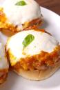 <p>Sink your teeth into this spin on the Italian classic.</p><p>Get the recipe from <a href="/cooking/recipe-ideas/recipes/a49120/chicken-parm-burger-recipe/" data-ylk="slk:Delish;elm:context_link;itc:0;sec:content-canvas" class="link ">Delish</a>.</p>