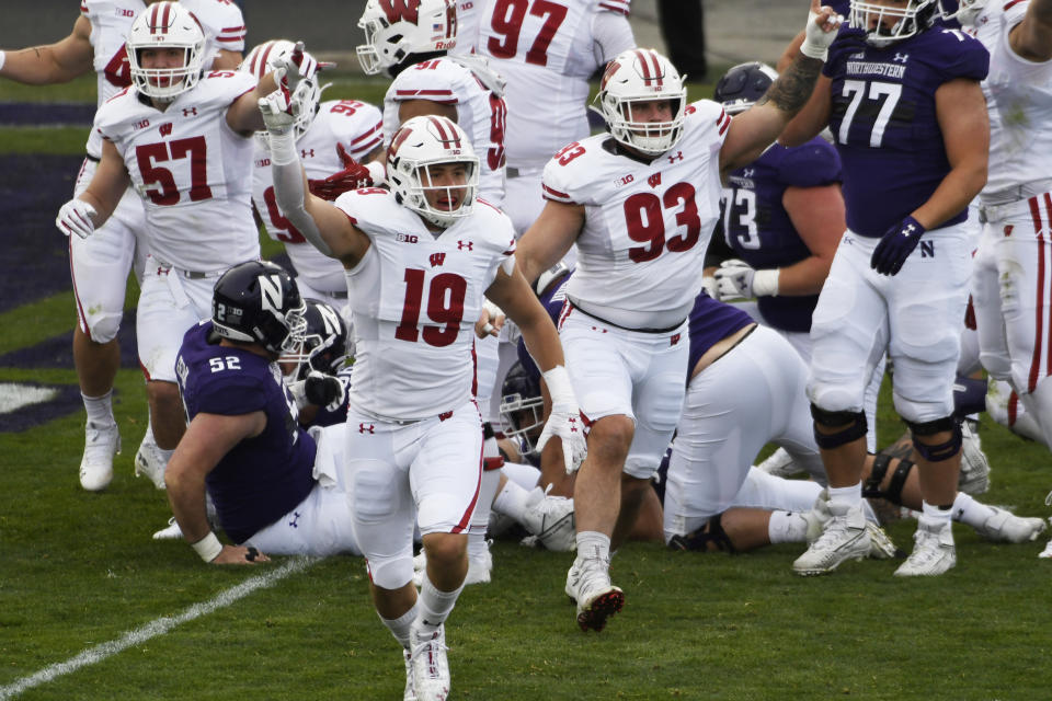 Nov 21, 2020; Evanston, Illinois, USA; Wisconsin Badgers linebacker Nick Herbig (19) celebrates his team’s fumble recovery against the Northwestern Wildcats during the first half at Ryan Field. Mandatory Credit: David Banks-USA TODAY Sports