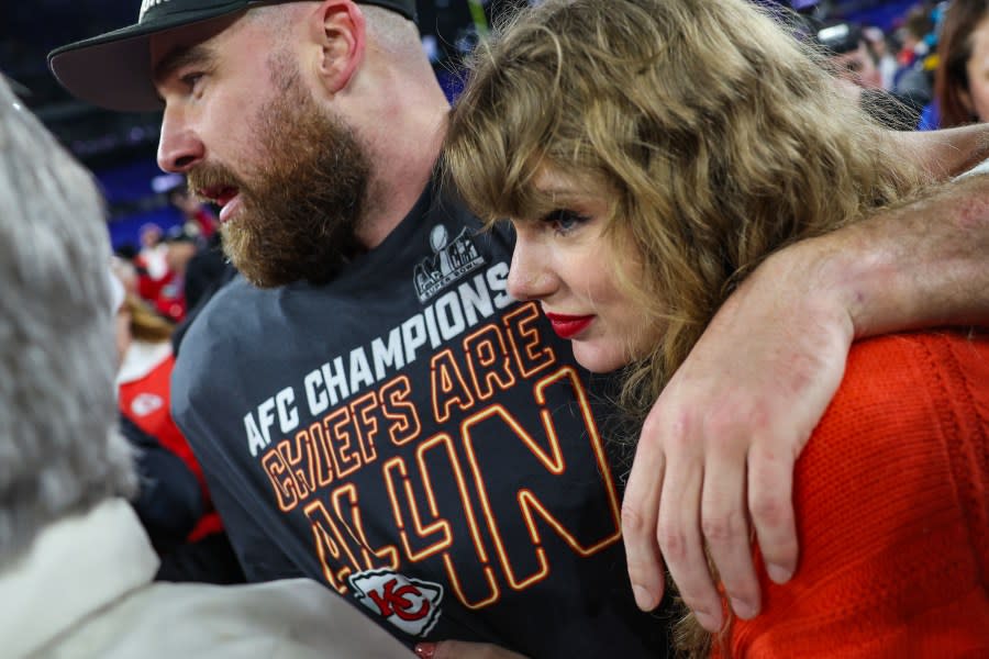 <em>Travis Kelce, #87 of the Kansas City Chiefs, L, celebrates with Taylor Swift after defeating the Baltimore Ravens in the AFC Championship Game at M&T Bank Stadium Jan. 28 in Baltimore. (Patrick Smith / Getty Images</em>)