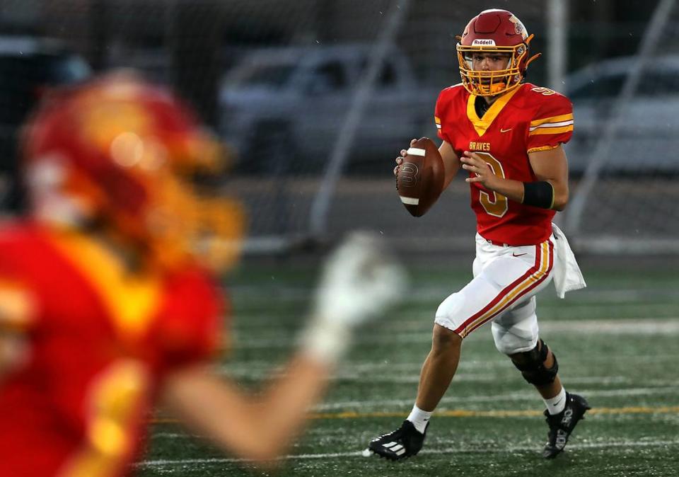 Kamiakin quarterback Trent Woodhouse looks downfield for an open receiver during the September 7, 2023 game against the Moses Lake Mavericks.