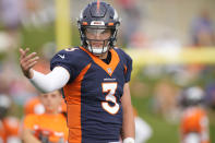 Denver Broncos quarterback Drew Lock takes part in drills at an NFL football training camp Tuesday, Aug. 3, 2021, at team headquarters in Englewood, Colo. (AP Photo/David Zalubowski)