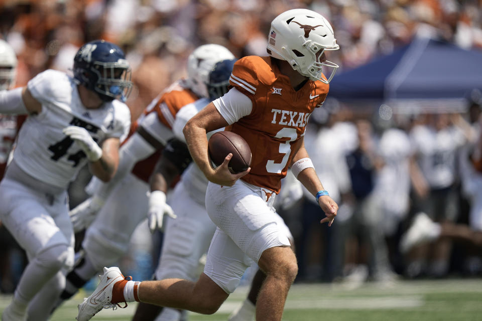 Texas quarterback Quinn Ewers (3) runs against Rice during the first half of an NCAA college football game in Austin, Texas, Saturday, Sept. 2, 2023. (AP Photo/Eric Gay)