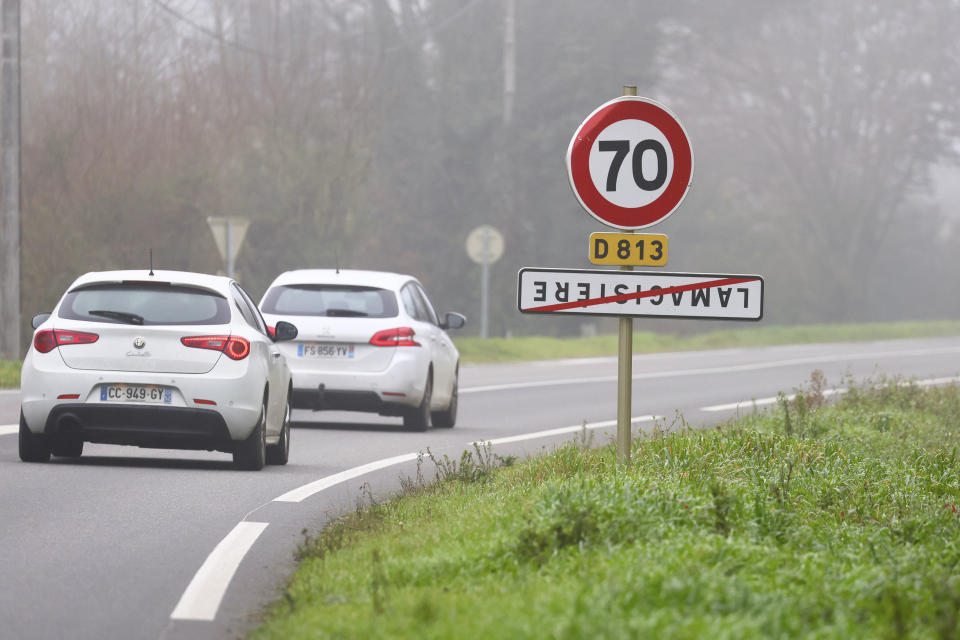 A road sign indicating the entrance of the French city of Lamagistere, southwestern France, has been turned upside down, in Lamagistere, Saturday, Jan. 27, 2024. Farmers have been turning road signs upside down to protest what they argue are nonsensical agricultural policies. (AP Photo/Fred Scheiber)