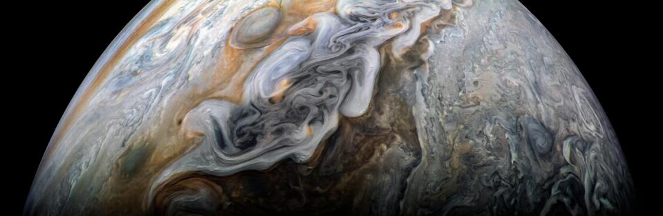 jupiter bands of purple orange clouds with gray anticyclones