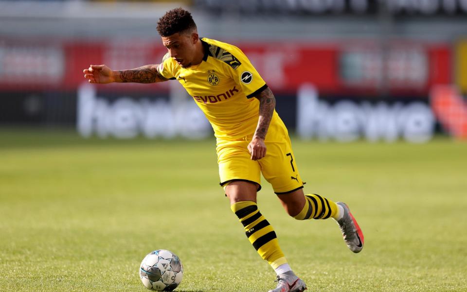 Jadon Sancho of Dortmund runs with the ball during the Bundesliga match between SC Paderborn 07 and Borussia Dortmund at Benteler Arena on May 31, 2020 - Borussia Dortmund forced to deny Jadon Sancho’s injury was a cover-up for breaking lockdown rules - GETTY IMAGES