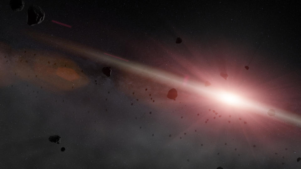 A glowing red light radiates from the right side of the image; silhouettes of comets and asteroids are seen scattered throughout.