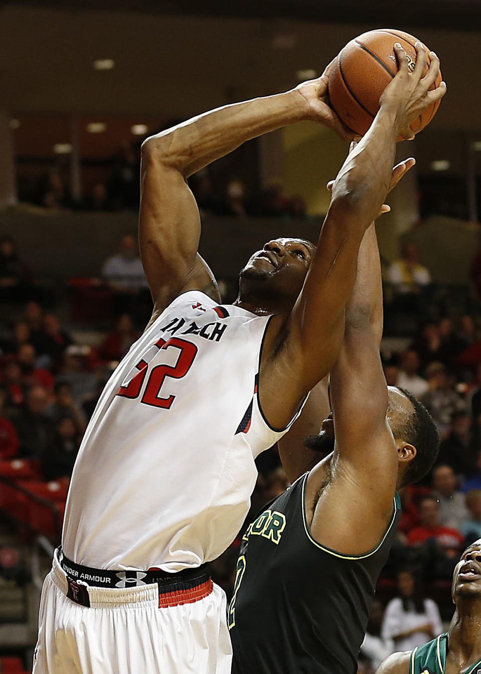 Texas Tech's Jordan Tolbert, left, shoots over Baylor's Rico Gathers during their NCAA college basketball game in Lubbock, Texas, Wednesday, Jan, 15, 2014. (AP Photo/Lubbock Avalanche-Journal, Tori Eichberger) ALL LOCAL TV OUT