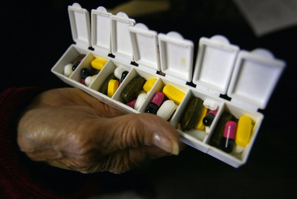 <span class="caption">Doctors will discuss how many medications seniors are taking during their wellness visits.</span> <span class="attribution"><a class="link " href="https://www.gettyimages.com/detail/news-photo/carole-jaquez-displays-a-box-of-pills-for-her-asthma-and-news-photo/51472431?adppopup=true" rel="nofollow noopener" target="_blank" data-ylk="slk:Spencer Platt/Getty Images;elm:context_link;itc:0;sec:content-canvas">Spencer Platt/Getty Images</a></span>