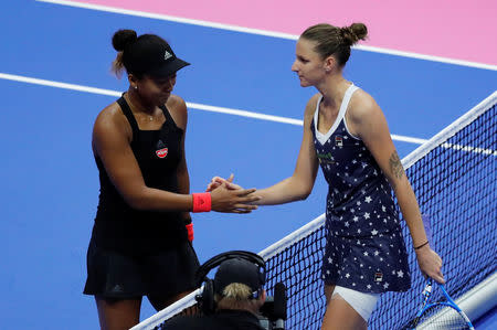 Tennis - Pan Pacific Open Women's Singles Final match - Arena Tachikawa Tachihi, Tokyo, Japan - September 23, 2018. Karolina Pliskova (R) of Czech Republic and Naomi Osaka of Japan shake hands after the match. REUTERS/Toru Hanai