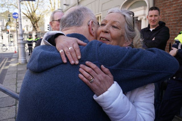 Stardust fire survivor Antoinette Keegan is embraced by Christy Moore after he performed at the national demonstration in support of Palestine (Brian Lawless/PA)