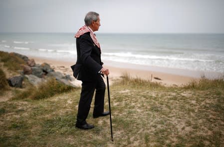 Charles Norman Shay, 94, a Penobscot Native American Indian WWII veteran, poses as he attends an interview with Reuters in Saint-Laurent-sur-Mer