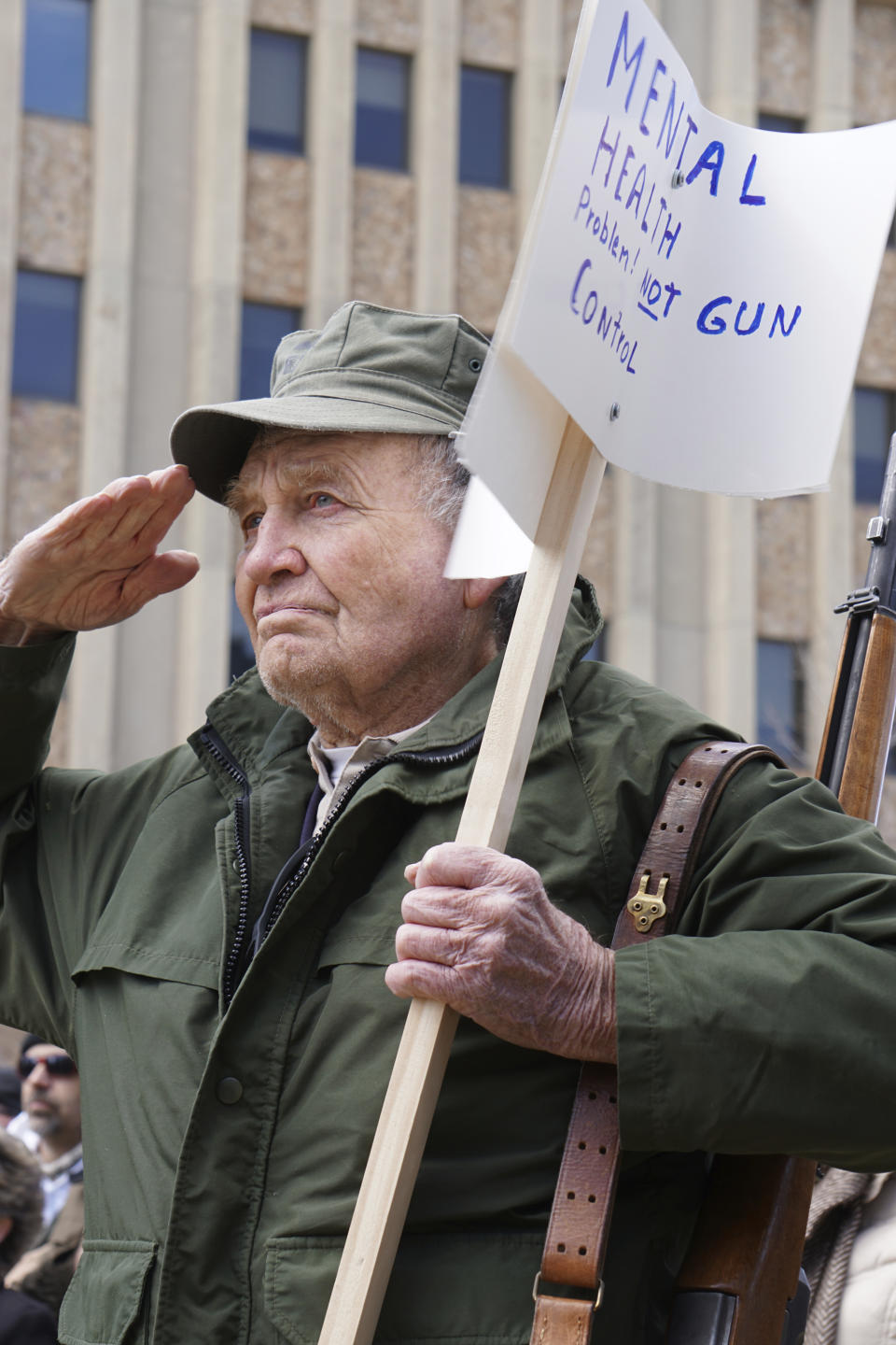 <p>Roy Fansler stands with an M1 Garand rifle at a gun rally Saturday, April 14, 2018, in front of the Wyoming Supreme Court in Cheyenne, Wyo. About 100 people took part including a handful openly carrying firearms. (Photo: Mead Gruver/AP) </p>