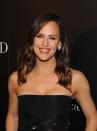 <p>Jennifer Garner was all smiles at a special screening for <em>Wakefield</em> in New York City. Outfitted in a chic strapless black dress, Garner kept her hair and makeup uncomplicated with loose, highlighted waves, winged eyeliner, and coral-red lipstick. (Photo: Getty Images) </p>