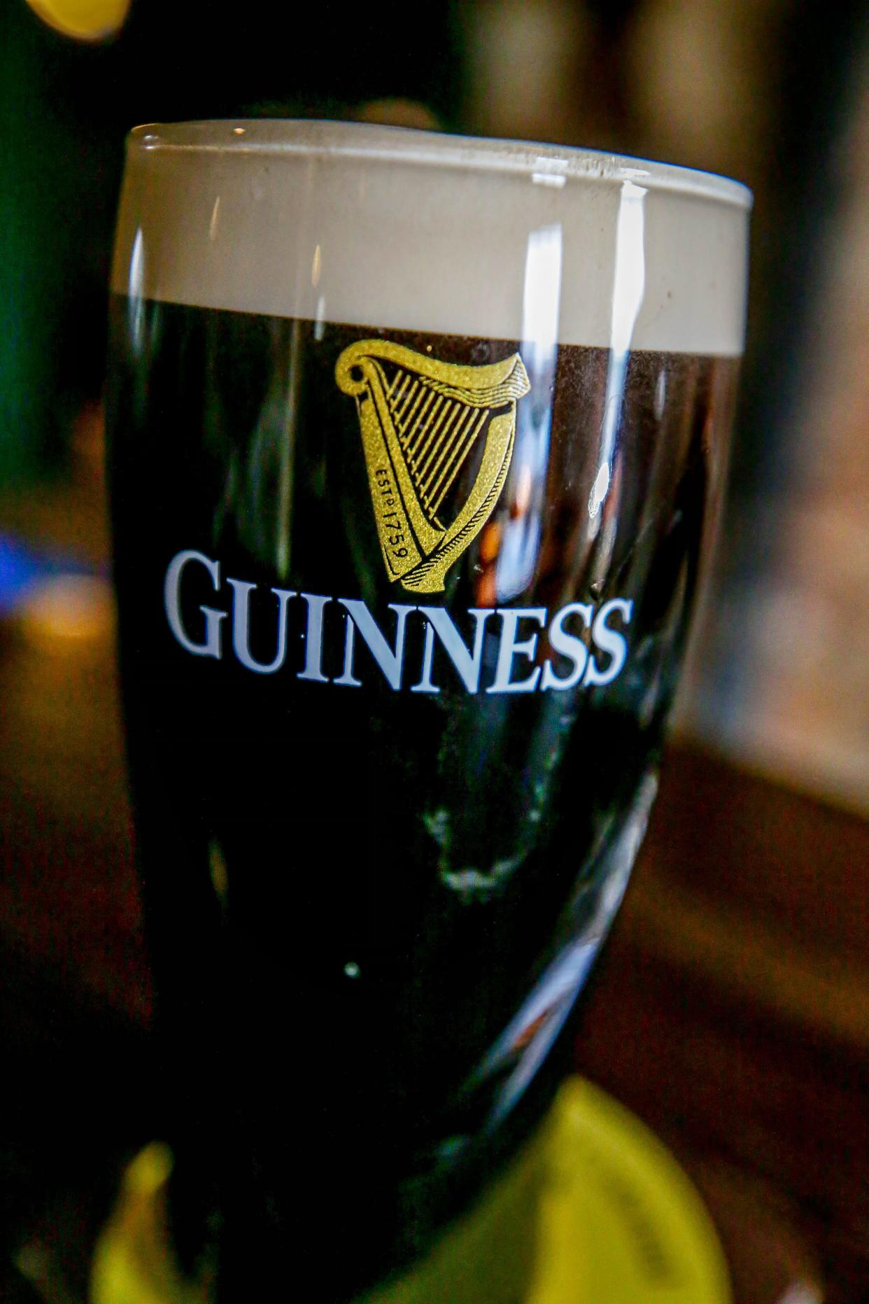 A correct Guinness pour should have the creamy head beginning at the top of the harp with the foam slightly rising over top of pint.