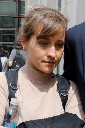 Actress Allison Mack departs the Brooklyn Federal Courthouse after facing charges regarding sex trafficking and racketeering related to the Nxivm cult case in New York, U.S., April 8, 2019. REUTERS/Shannon Stapleton