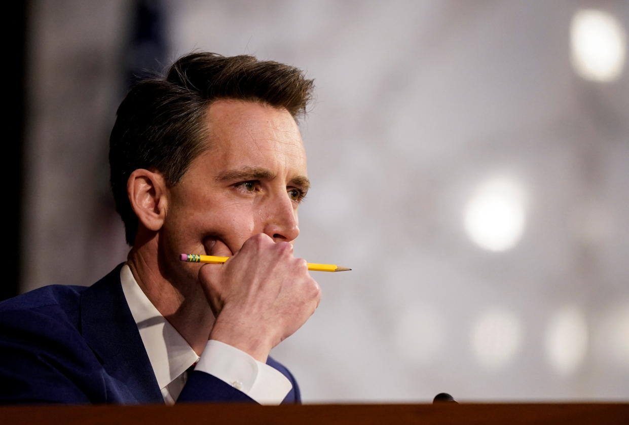 Senator Josh Hawley sits listening during a Senate Judiciary Committee confirmation hearing.