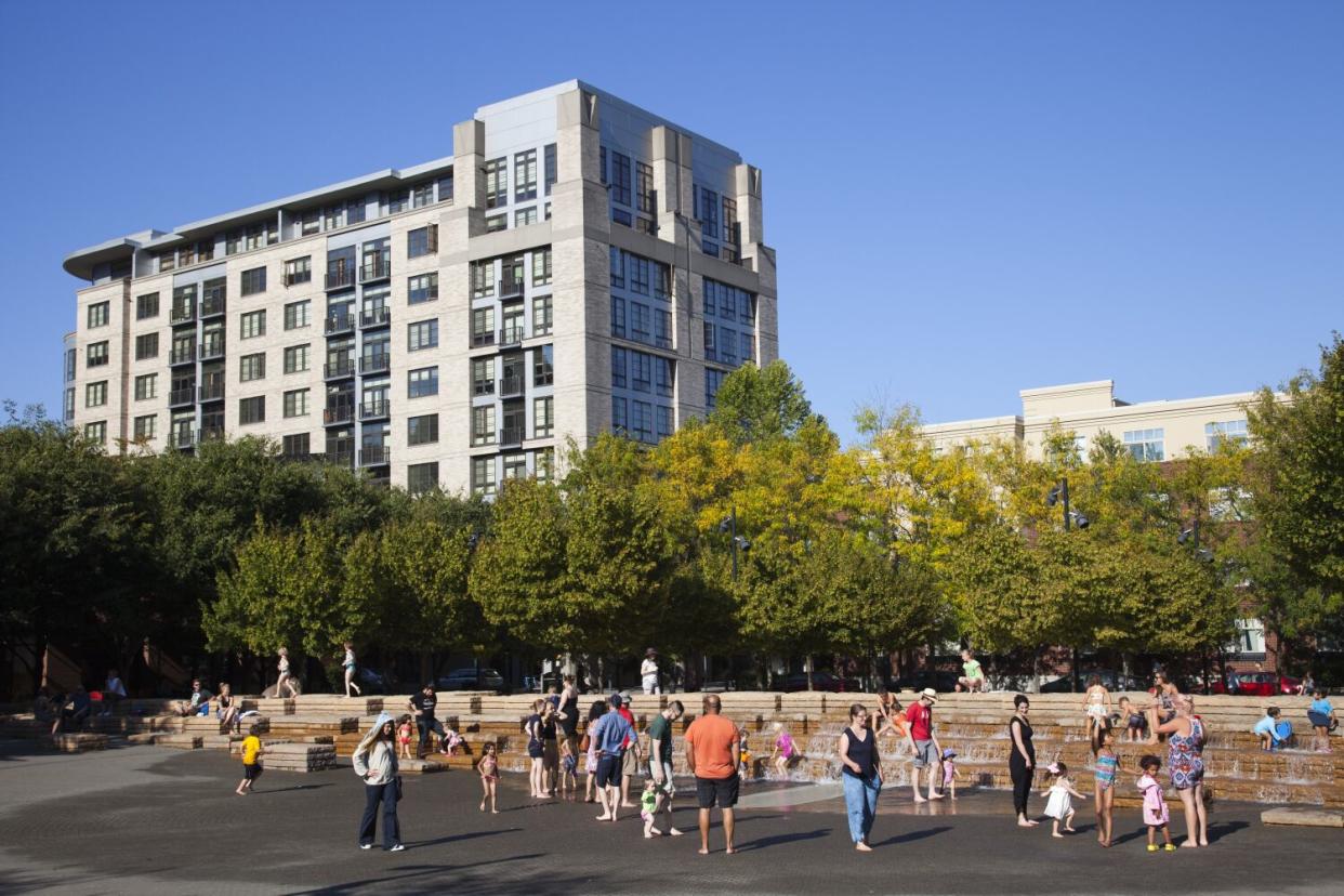 Portlanders enjoy a sunny day at Jamison Square.