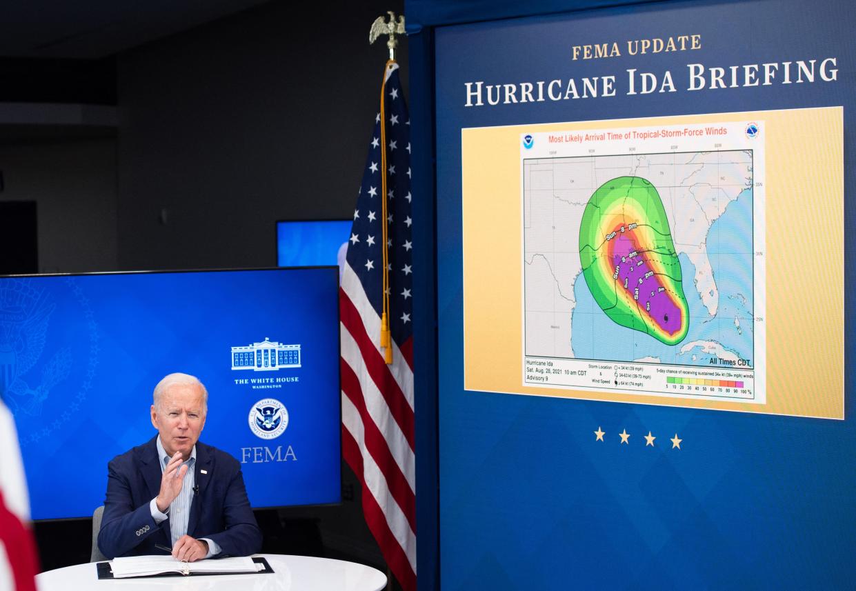 U.S. President Joe Biden is virtually briefed by Federal Emergency Management Agency officials on preparations for Hurricane Ida, in the South Court Auditorium of the White House in Washington, DC, on Aug. 28, 2021. Authorities in Louisiana and elsewhere on the U.S. Gulf Coast issued increasingly dire sounding warnings Saturday as Hurricane Ida, a storm expected to pack powerful 130mph (209kph) winds, moved with unexpected speed toward the New Orleans area.