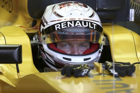 Formula One F1 - U.S. Grand Prix - Circuit of the Americas, Austin, Texas, U.S., 21/10/16. Renault's Kevin Magnussen of Denmark sits in his car as he prepares for the first practice session. REUTERS/Adrees Latif