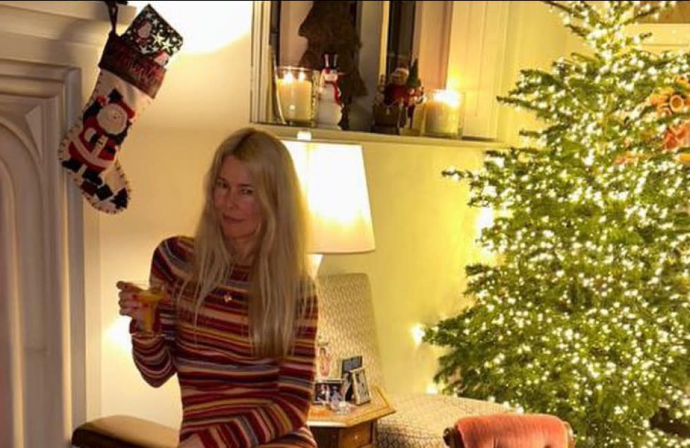 Claudia Schiffer showed fans she celebrated Christmas by hanging out a customised Versace stocking and filling her mansion with ornaments and vintage wines credit:Bang Showbiz