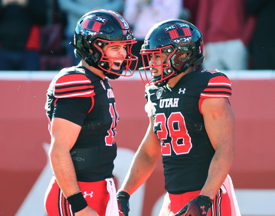 Utah Utes safety Sione Vaki (28) celebrates his touchdown with Utah Utes quarterback Bryson Barnes (16) against the California Golden Bears in Salt Lake City on Saturday, Oct. 14, 2023. Utah won 34-14. | Jeffrey D. Allred, Deseret News