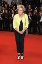 <p>Emma was her usual fun self in a lemon jacket and sculptural shoes.<br><i>[Photo: Getty]</i> </p>