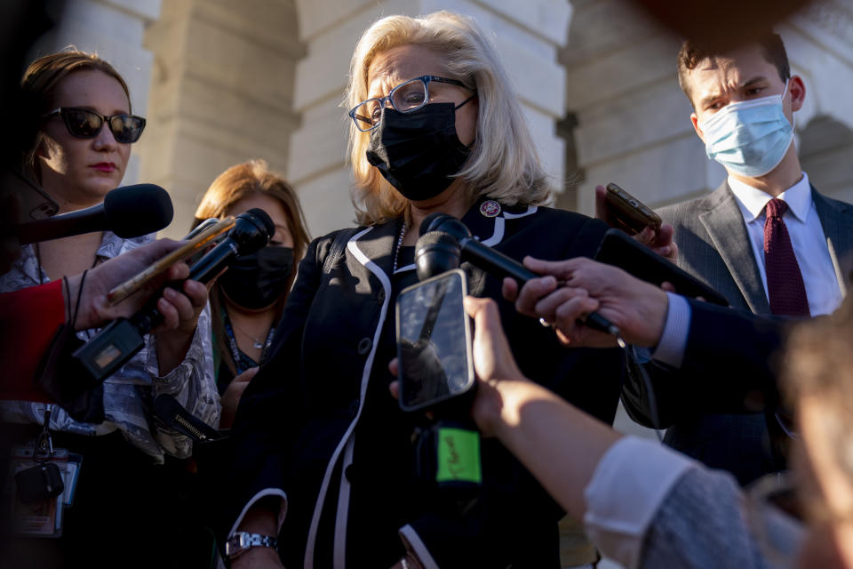 Rep. Liz Cheney, R-Wyo., speaks to reporters after the House voted to hold former White House Senior Adviser Steve Bannon in contempt of Congress for defying a subpoena from the committee investigating the violent Jan. 6 Capitol insurrection Thursday, Oct. 21, 2021, at the Capitol in Washington. (AP Photo/Andrew Harnik)