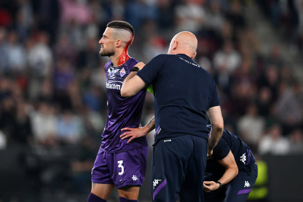 Video Shows Soccer Player Getting Bloody Head Wound After Being Pelted With  Trash by Fans