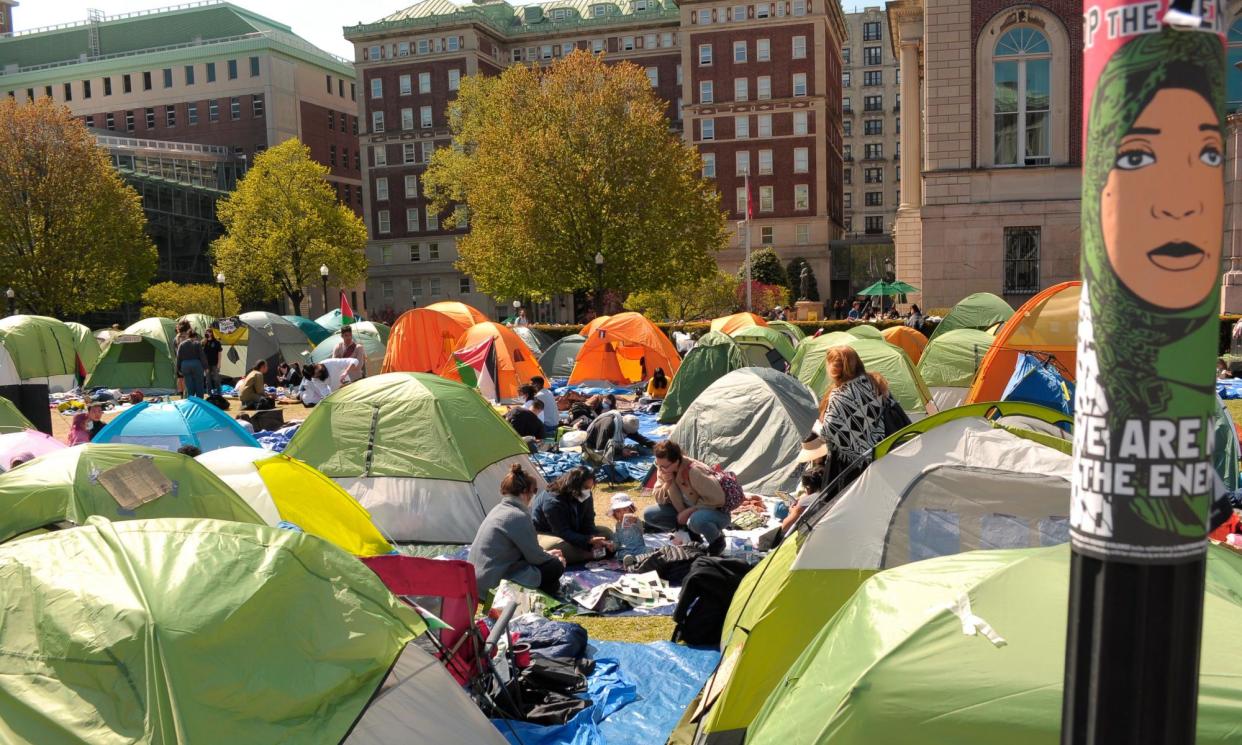 <span>Protesters at a pro-Palestine encampment at Columbia University in New York, on 26 April 2024.</span><span>Photograph: Jimin Kim/SOPA Images/REX/Shutterstock</span>