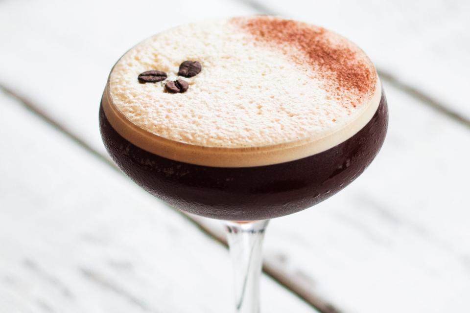 espresso martini cocktail on white table