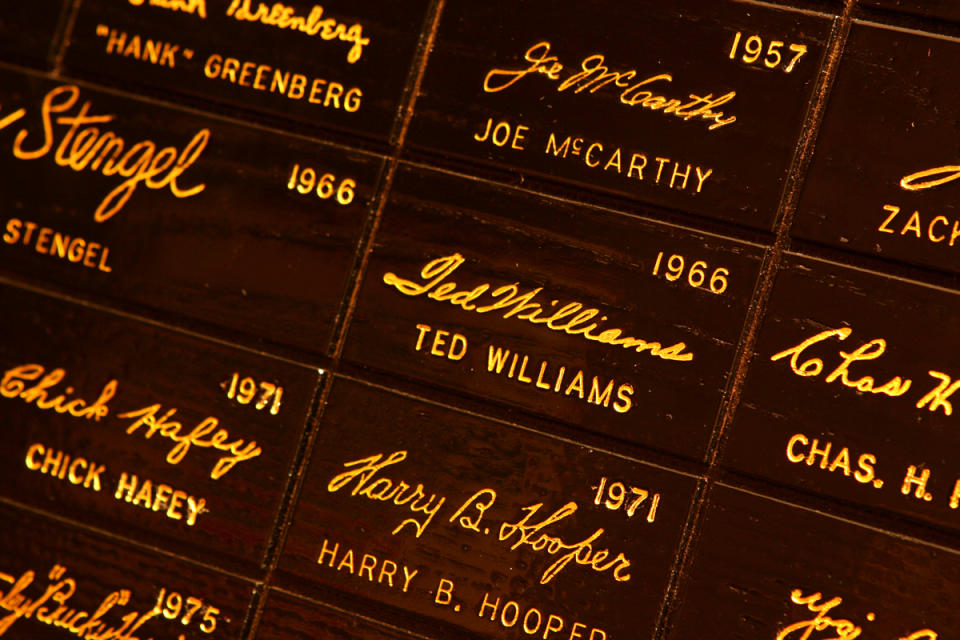 This undated image released by the Louisville Slugger Museum & Factory shows the signature of Boston red Sox player Ted Williams, center, on the signature wall at the museum in Louisville, Ky. Visitors can trace that baseball heritage along the Louisville Slugger Walk of Fame, stretching about a mile from the Louisville Slugger Museum & Factory to the city’s minor-league ballpark. (AP Photo/H&B, James Moses)