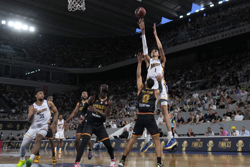 Boulogne-Levallois' Victor Wembanyama (1) drives to the basket in action during the playoffs of the Elite basketball match Boulogne-Levallois against Monaco at the Roland Garros stadium in Paris, Thursday, June 15, 2023. (AP Photo/Thibault Camus)