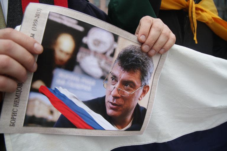 Marchers rally in memory of murdered Kremlin critic Boris Nemtsov in Vilnius, Lithuania, on March 1, 2015