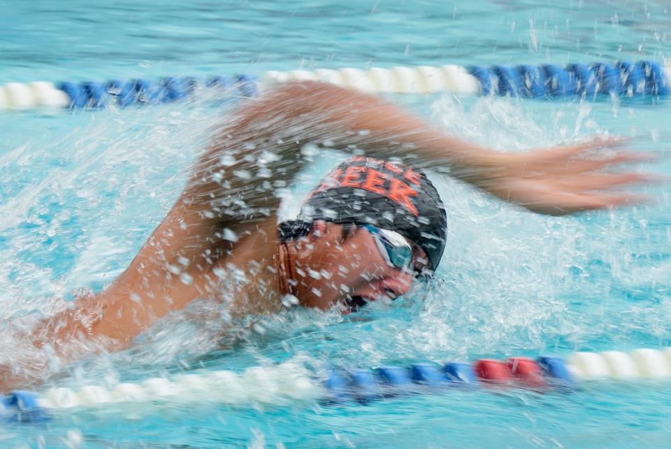 Spruce Creek's Kyle Kwong competes in the 100-yard freestyle race at the Record Breaker Invitational at the Port Orange YMCA, Saturday, Sept. 16, 2023.