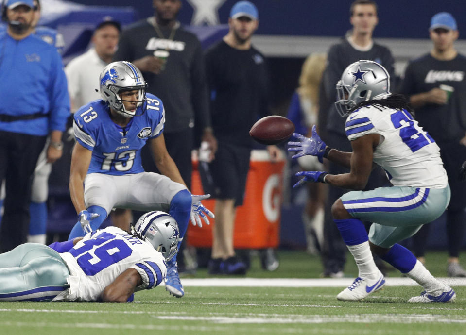 Dallas Cowboys strong safety J.J. Wilcox intercepts a pass from the Detroit Lions' Matthew Stafford during a 2016 game. (AP Photo/Brandon Wade)